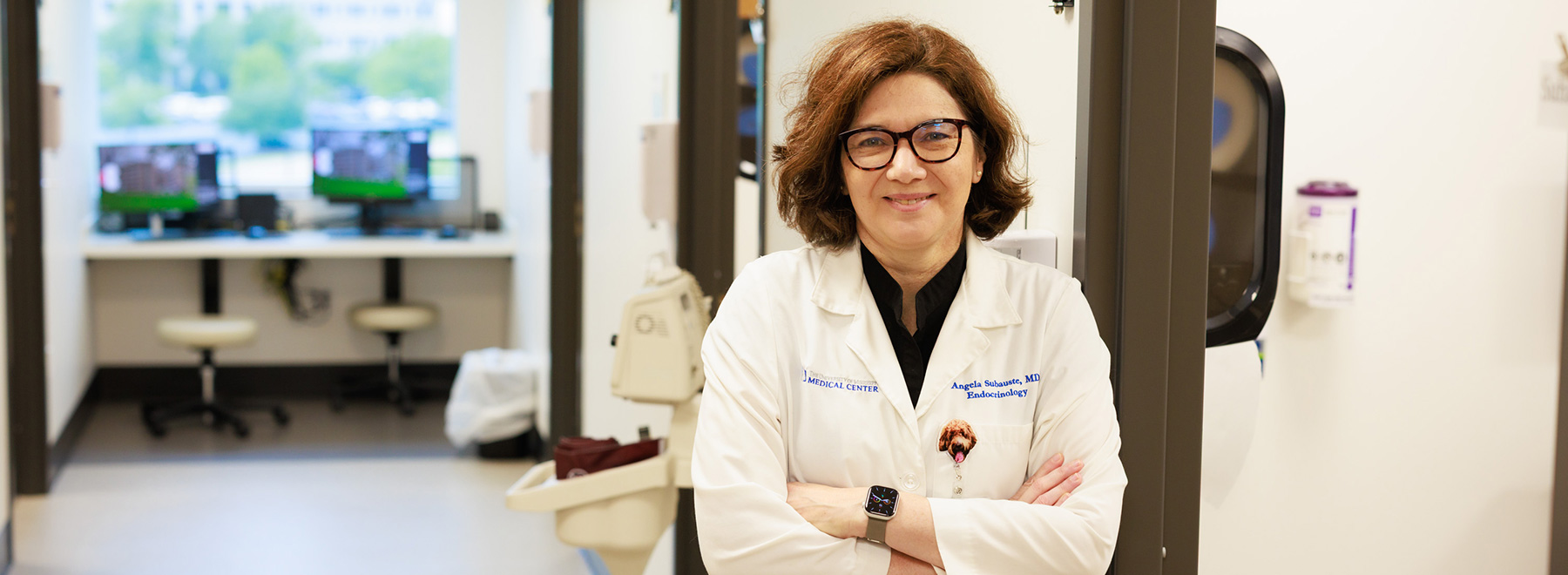 Dr. Angela Subauste standing in a hallway.